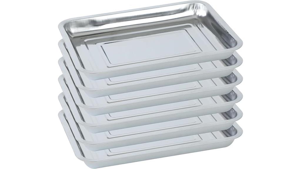 six stainless steel trays